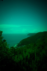 green light on sea cliff